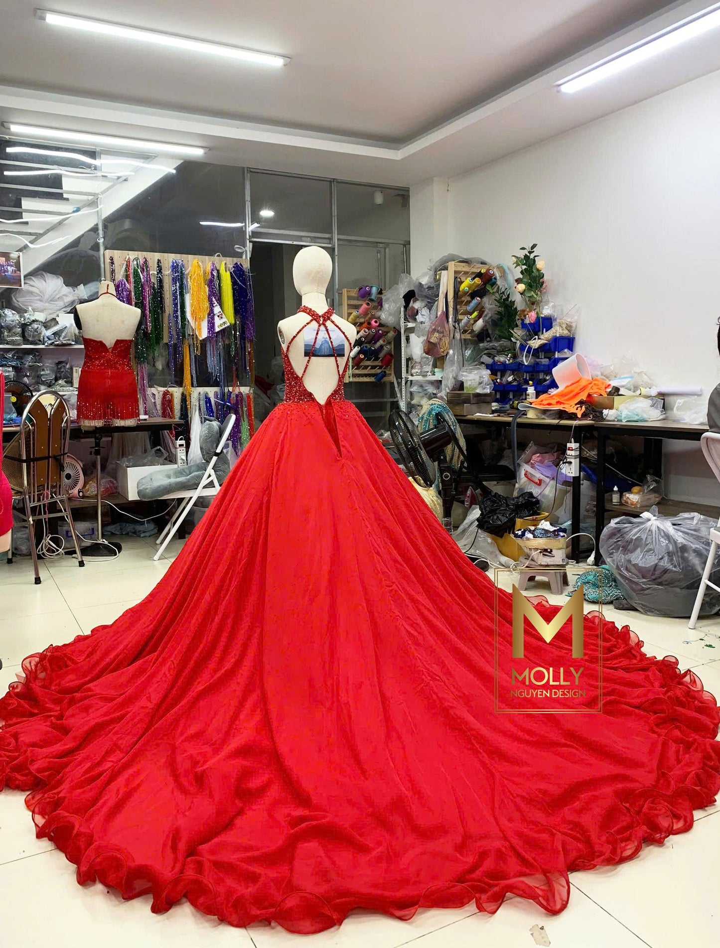 The red gown for girls between 130 cm and 150 cm tall